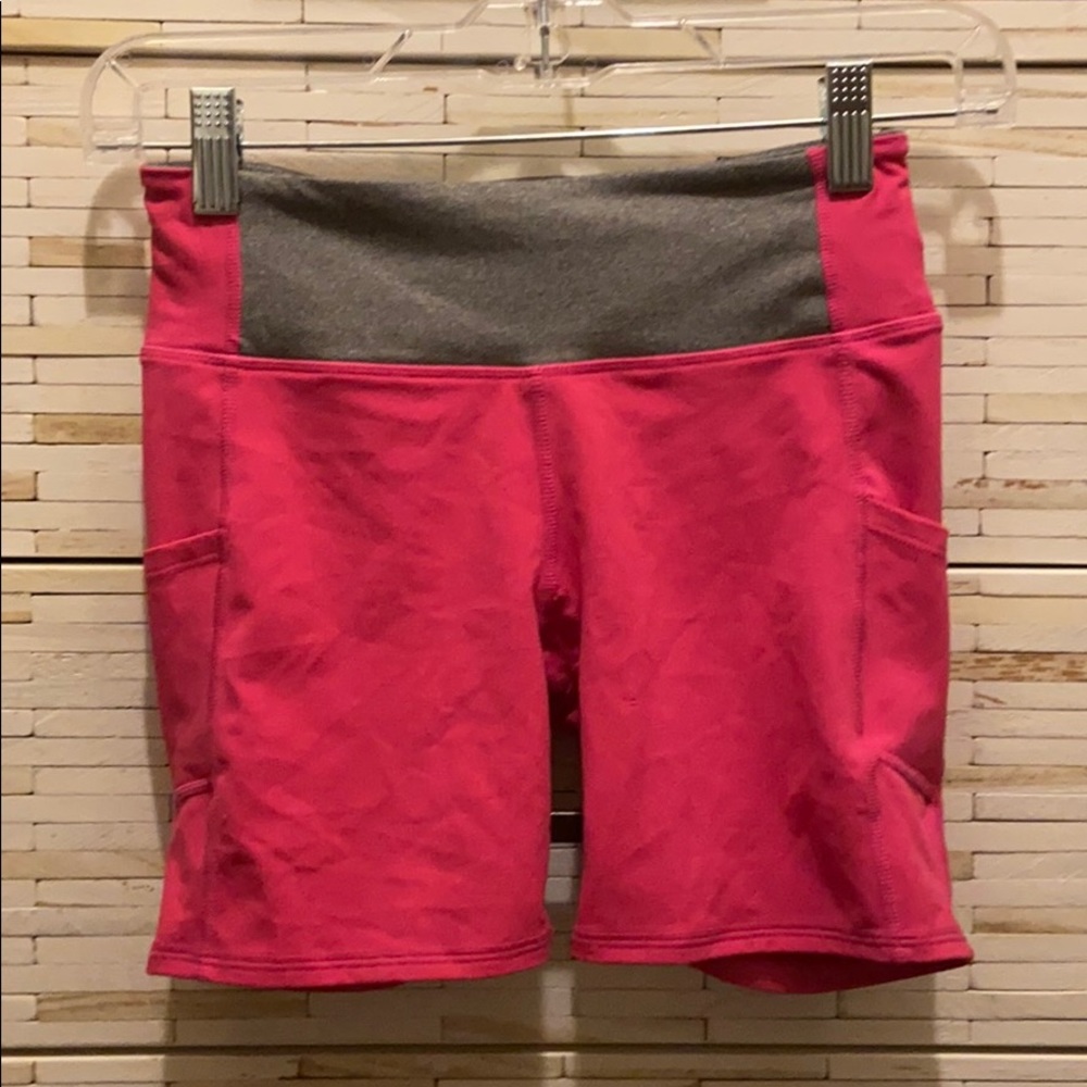 Fabletics hot pink bike shorts